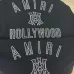 AMIRI Black Hoodie With Bold White Hollywood Logo And Ornate Emblem #A54289