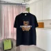 Burberry Black/Green/Purple/White T Shirt with Classic Check Pattern Teddy Bear Graphic Design for Casual Streetwear Style #A54260